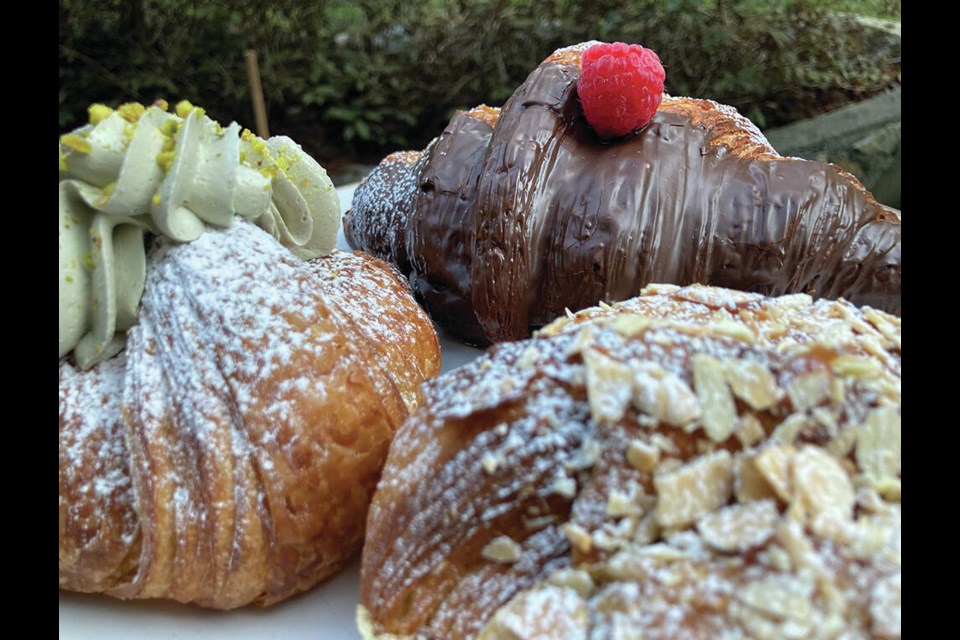 Angus T bakery, now open in Park Royal in West Vancouver, specializes in decadent croissants. Displayed here are the  Pistachio and Raspberry, Dark Chocolate Raspberry, and Double Baked Almond. | Andy Prest / North Shore News