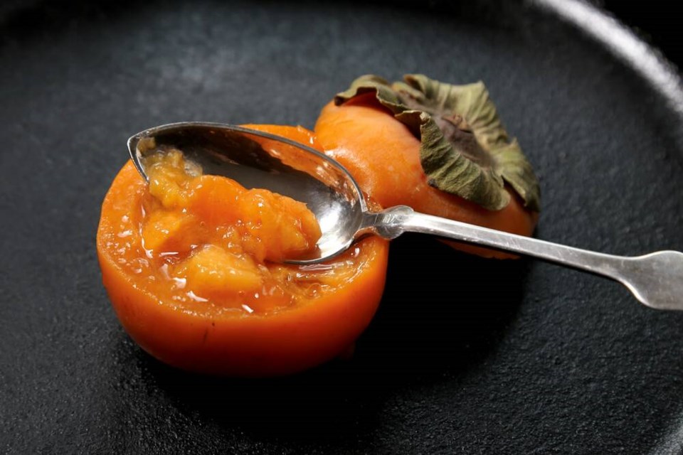 Voluptuous, delicious, nutritious fuyu persimmon is remarkably delicious, promising a juicy melange of melon, apricot and papaya. | Laura Marie Neubert 