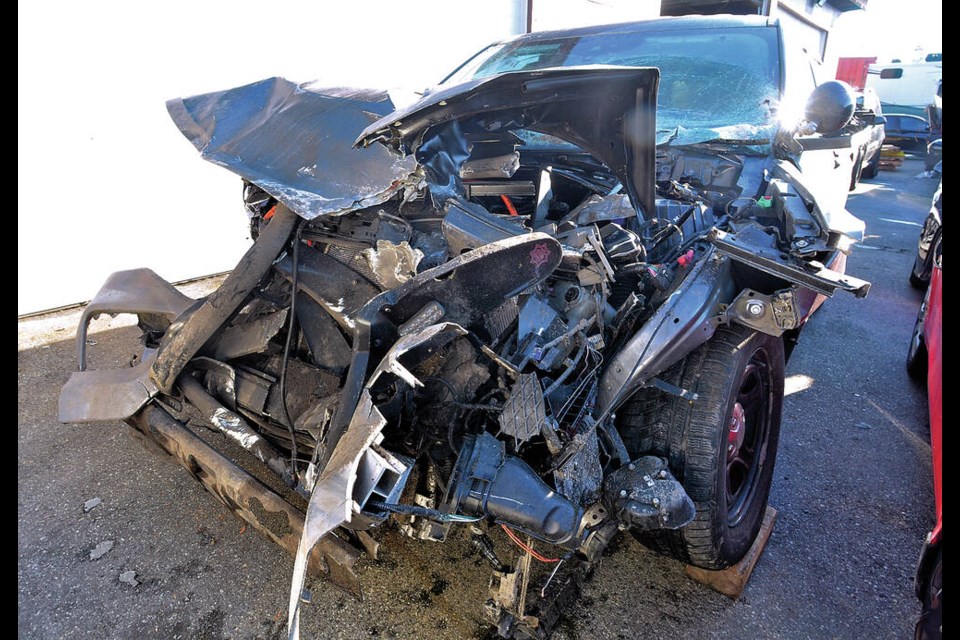 A West Vancouver Police Department SUV was totalled by a rockfall on Cypress Bowl Road just east of the District of West Vancouver works yard, Friday, Nov. 11, 2022. The police officer driving the vehicle was sent to hospital with injuries and is now recovering. Another vehicle was also struck by rock. | Paul McGrath / North Shore News
