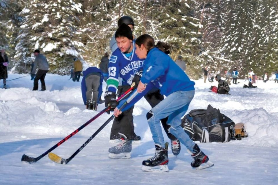 In the last few days of 2021, the temperature dipped low enough to allow some fresh water bodies on the North Shore to freeze over. Paul McGrath got a rare chance to get some shots of the action. “You don't always get the right weather conditions to photograph hockey on Rice Lake, but last Christmas break was cold enough for an extended period to allow endless games of shinny.” | Paul McGrath / North Shore News