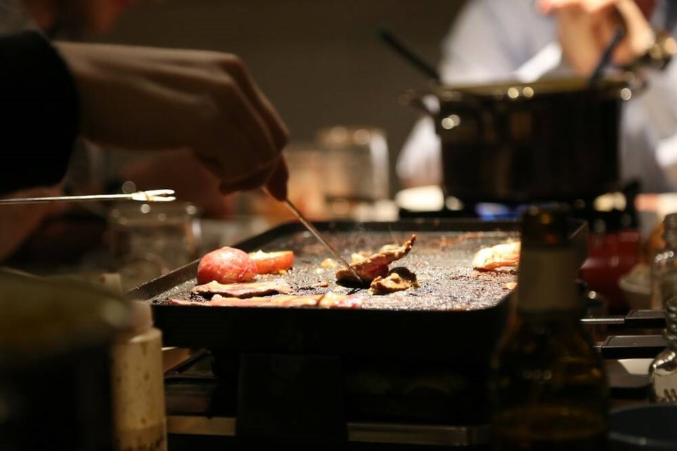 Guests can cook their own meat, seafood and produce on hot grills and in savoury broth.  | Laura Marie Neubert