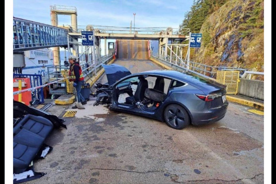 A Tesla snapped in two following a crash at the BC Ferries terminal at Horseshoe Bay on Jan.14, 2023. Our story about the crash was the most-clicked article on nsnews.com for 2023. | WVPD 