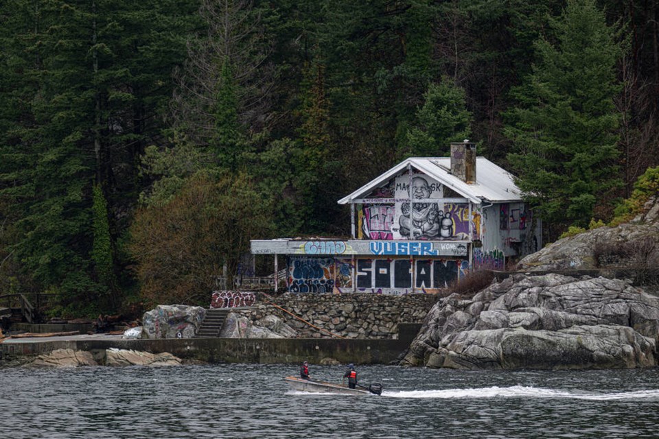 The house on the end of Tyee Point near West Vancouver's Horseshoe Bay has sat abandoned for years. A recent post about the 'party house' covered in graffiti attracted attention on social media. | Mark Teasdale 