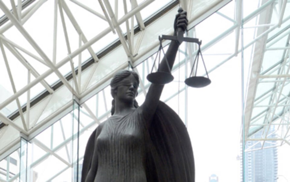 web1_bc-supreme-court-justice-statue