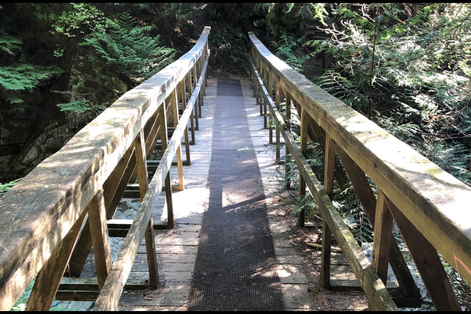 14-metre long Baden Powell/Trans Canada Trail footbridge over Brothers Creek in West Vancouver has been permanently closed after it was found to be rotting. | District of West Vancouver 
