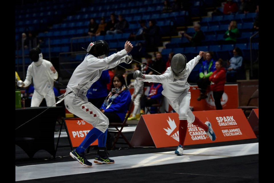 Ivan Lu of West Vancouver (right) fences his way to a gold medal last Thursday. | Christopher Singleton / Canada Winter Games 