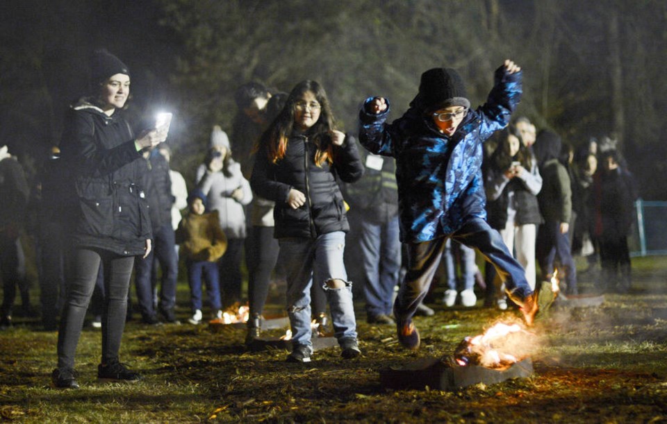 web1_nowruz-west-vancouver-fire-jumping-boy