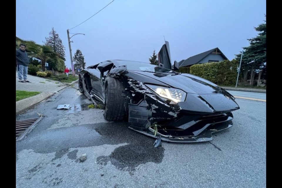 A wrecked Lamborghini Aventador sits in North Vancouver after the driver crashed into a home's retaining wall on Saturday, April 22. North Vancouver RCMP are investigating. | Pat Bell