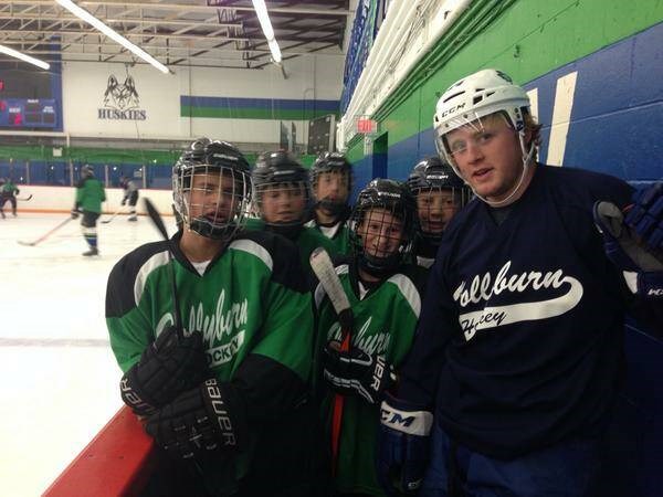 Morgan Rielly (right) spending time on the ice with Hollyburn Huskies minor hockey players during the Bantam Rep Prep Bootcamp in August 2014. | Courtesy of Hollyburn Hockey 