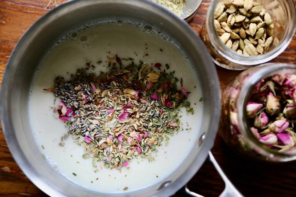 Steeping organic chamomile, mint, rose petal, fennel, cardamom & lavender in unsweetened almond milk. | Laura Marie Neubert 