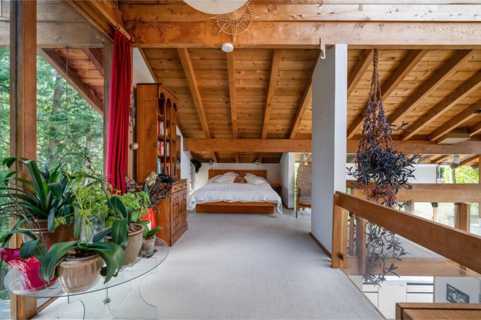 An open bedroom on the lofted top floor. | Royal LePage Sussex