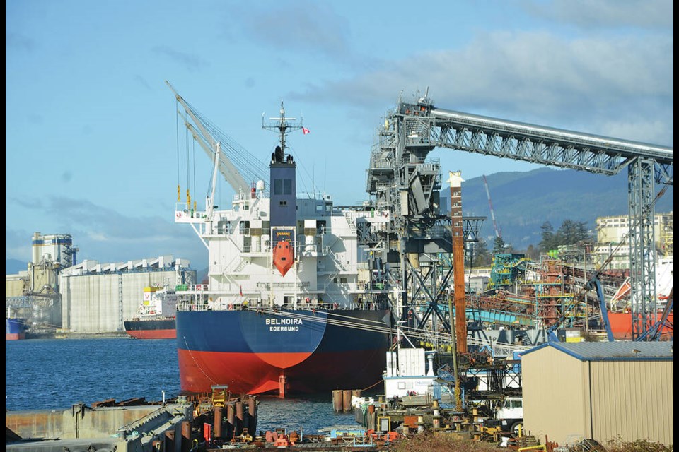 A grain ship loads at the G3 grain terminal in North Vancouver on Feb. 14, 2023. | Brent Richter / North Shore News 