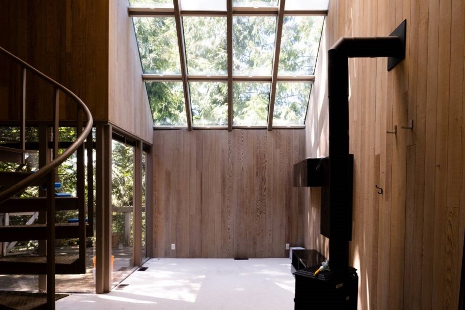 A skylight lets natural light into a living area in Hassell House. | Gavin Froome 