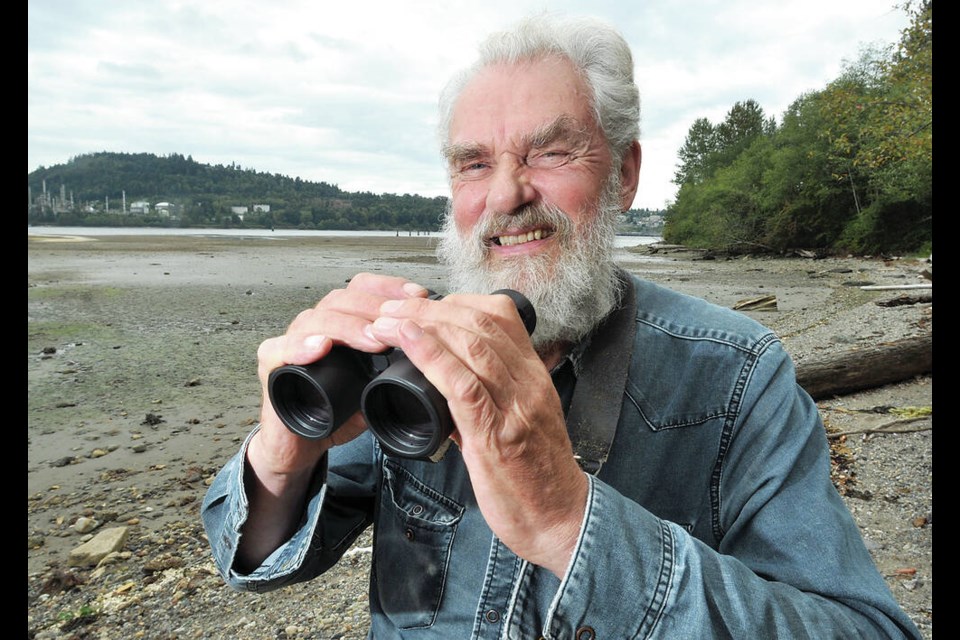 Kevin Bell checks out the view at Maplewood Flats Conservation Area in 2017. | Paul McGrath / North Shore News 