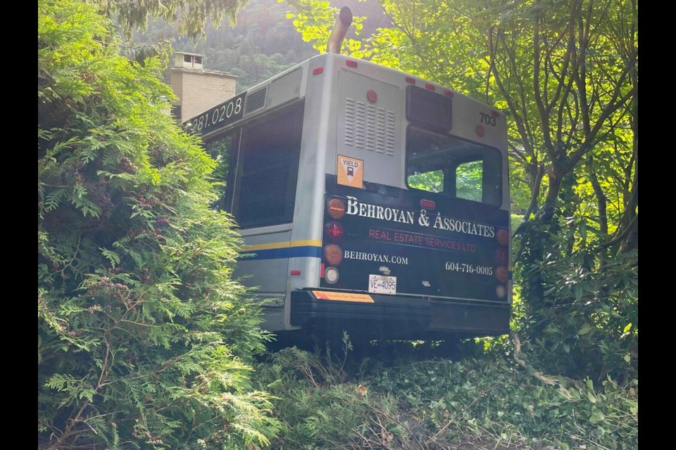A West Vancouver Blue Bus rolled downhill without its driver and into a yard in Horseshoe Bay Tuesday morning. The cause of the accident is still under investigation. | Jane Seyd / North Shore News 