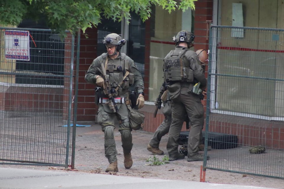 The RCMP's Integrated Emergency Response Team was called out June 17 after a suspect waved a knife at a security guard, then attempted to escape on a rooftop. | Wisam Souki 