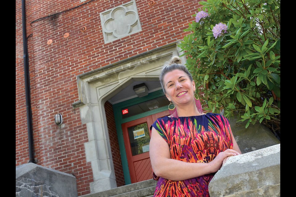 Tara Zielinski, principal of Ecole Pauline Johnson Elementary in West Vancouver, stands outside the school, which celebrates its 100th anniversary this year. | Paul McGrath / North Shore News 