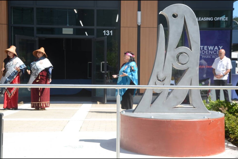 Two identical sculptures crafted by Squamish Nation artists have been installed in Park Royal’s south plaza. | Mina Kerr-Lazenby / North Shore News