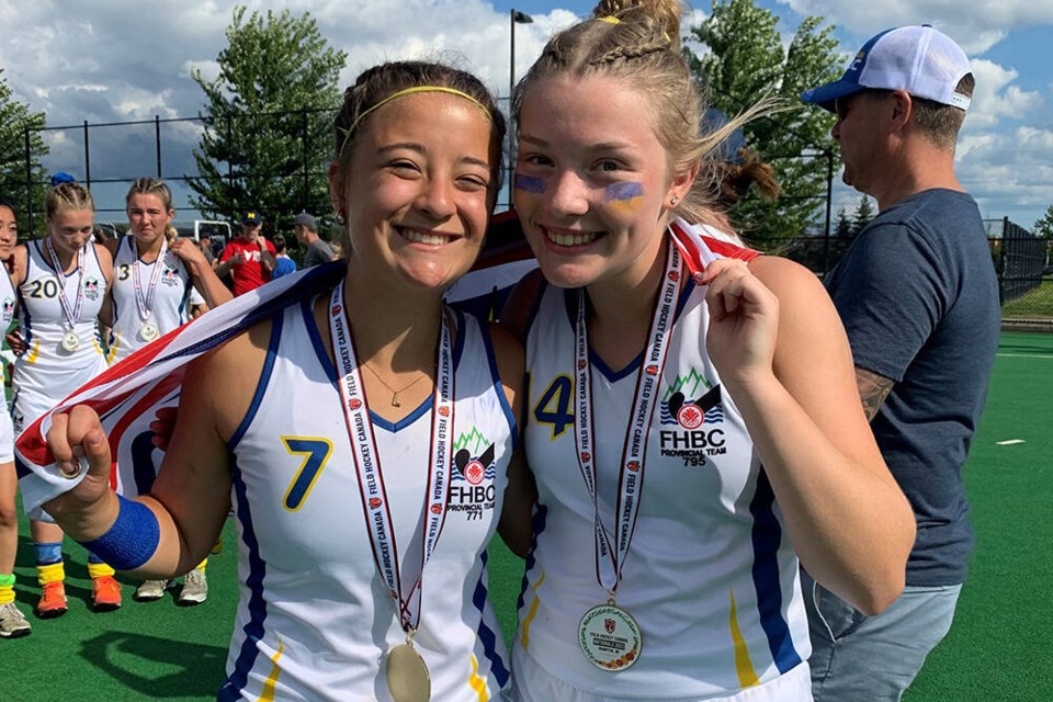 North Vancouver’s Lindsey Hills and Ella Rideout celebrate a gold medal win for Team BC Blue at the U18 Field Hockey Nationals July 30 in Brampton, Ont. | Susan Hills 