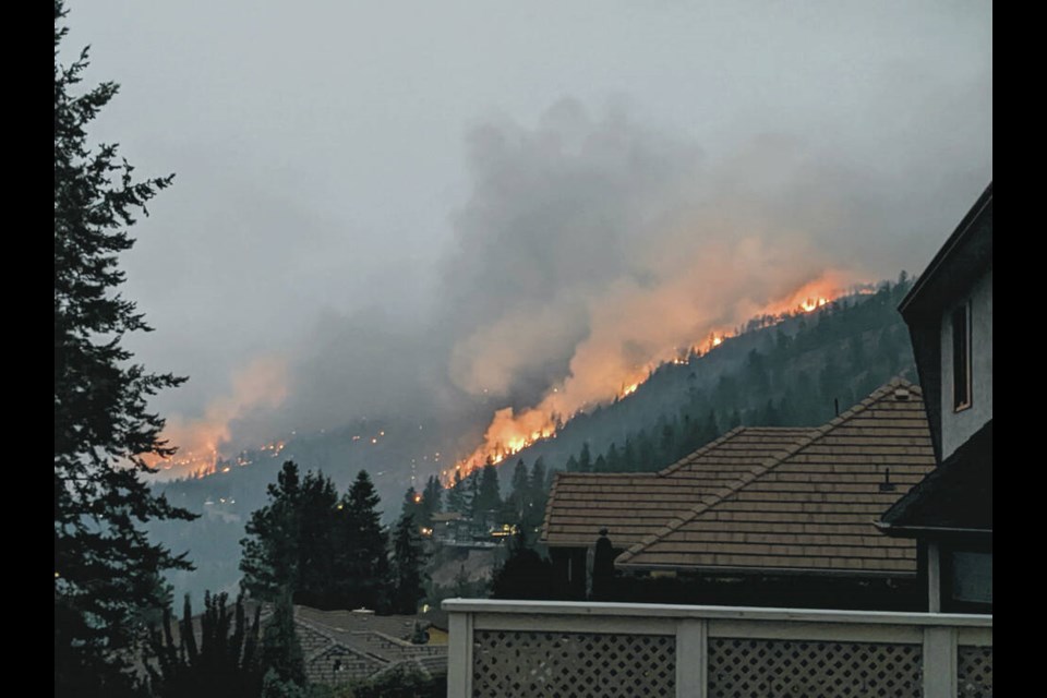 The wildfire in the West Kelowna area coming close to houses. VIA CASTANET 