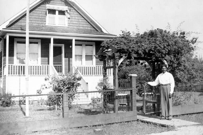 Prominent longshoreman and union advocate William Fitzclarence “Fitz” St. John stands in front of the home he built at 2421 Western Ave. in North Vancouver in 1911. North Vancouver Museum Archives 7613 