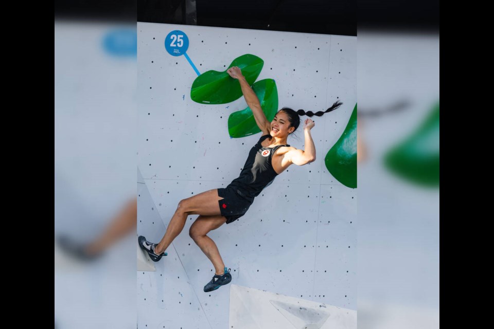 Sport climber Alannah Yip, 29, of North Vancouver completes a bouldering problem at the Pan American Games in Santiago, Chile. | Courtesy of Climbing Escalade Canada