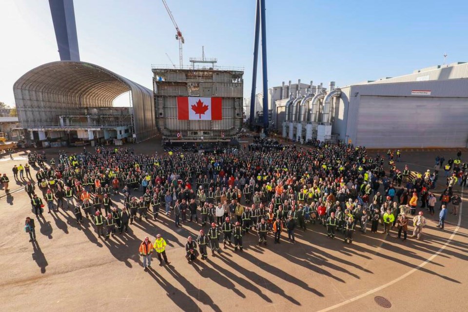 Members of the Royal Canadian Navy joined Seaspan employees and executives at Friday’s keel laying ceremony at Seaspan Shipyards. | Seaspan/Heath Moffatt. 