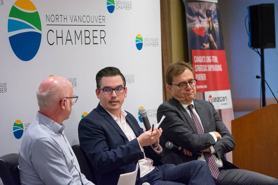 Moderator and chamber CEO Patrick Stafford-Smith poses questions to Burnaby North-Seymour MP Terry Beech and North Vancouver MP Jonathan Wilkinson at a Q&A event hosted by North Vancouver Chamber on Friday, Oct. 13. | Nick Laba / North Shore News 