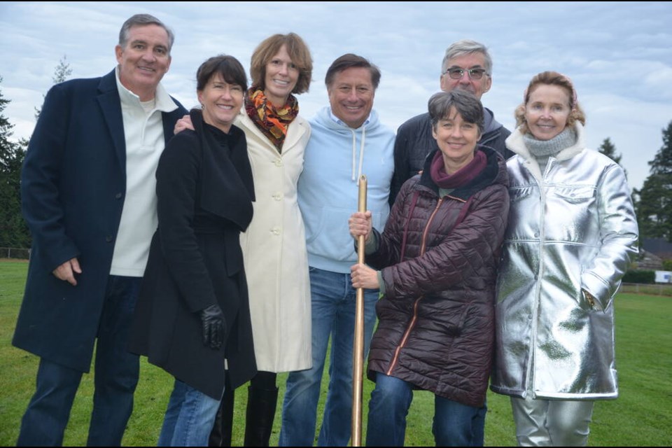 District of West Vancouver Mayor Mark Sager was joined by council members in breaking the old turf at West Vancouver Secondary, signaling the start of a construction project to build a new sports facility. | Mina Kerr-Lazenby / North Shore News 