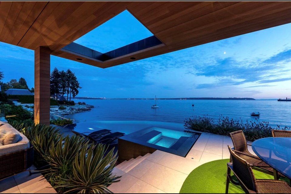 This modern home on the West Bay waterfront at 3378 Radcliffe sold for $32.8 million. | photo courtesy Brock Smeaton 
