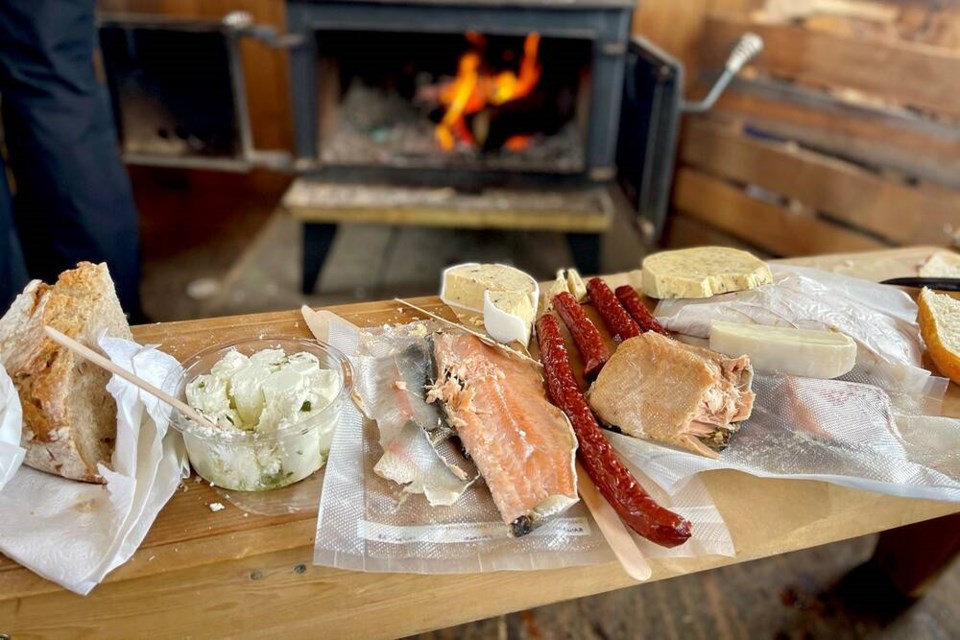 Gourmet picnic featuring thyme-smoked trout, in an alpine warming hut in the Kootenays. | Laura Marie Neubert 