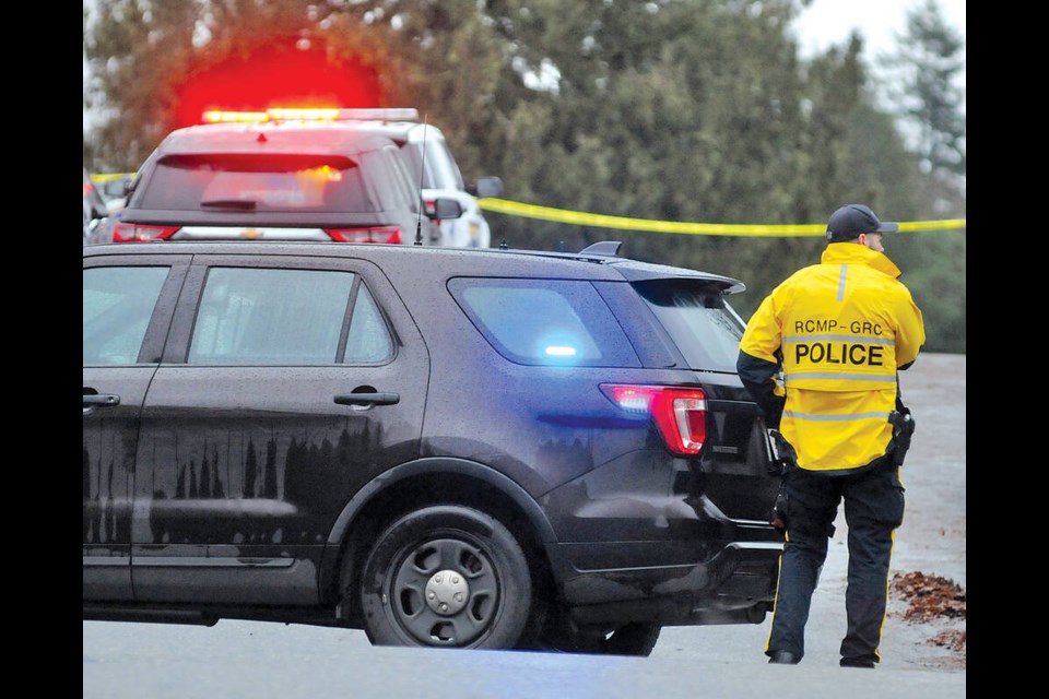 Police closed 18th Street between St. Georges and St. Andrews avenues in North Vancouver while ERT members dealt with an incident. | Paul McGrath / North Shore News 