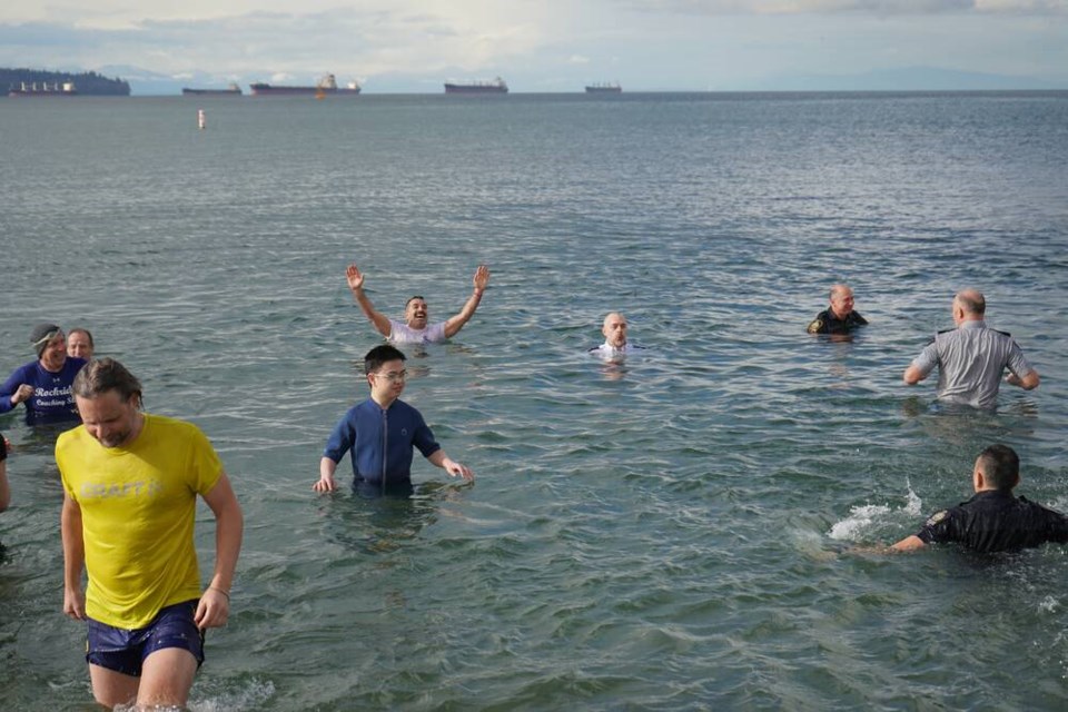 North Vancouver RCMP, West Vancouver Police, North Shore Rescue and a large number of supporters brave the icy waters in West Vancouver on Feb. 29 to raise money for Special Olympics B.C. | North Vancouver RCMP 