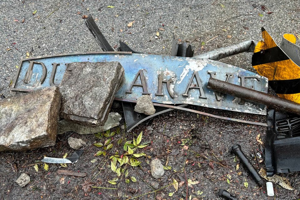 The former Dundarave community marker on Marine Drive was reduced to a pile of rubble, twisted metal and mangled lettering in a collision Feb. 21. | District of West Vancouver 