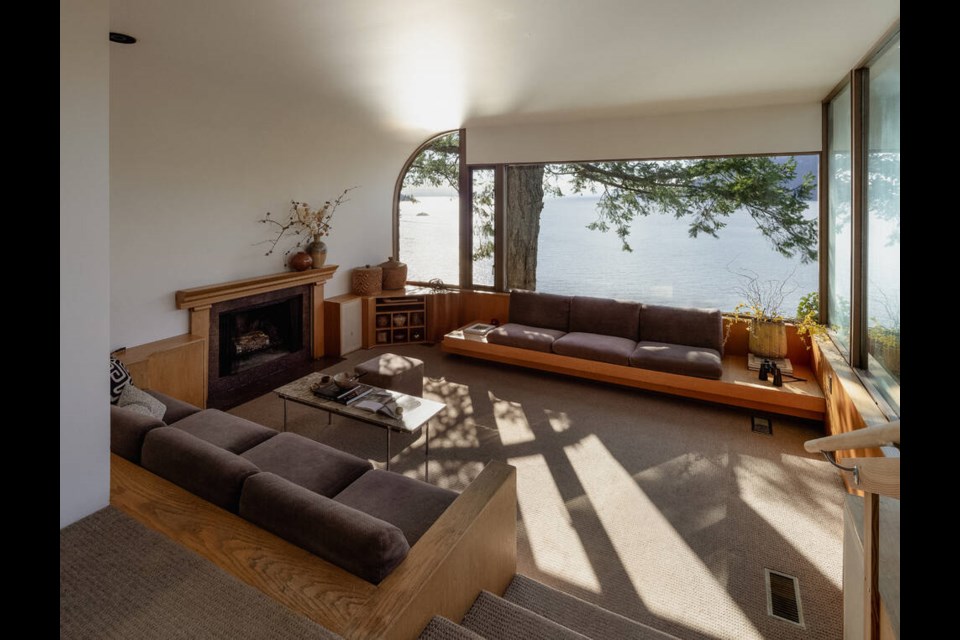 Daylight spills into the living room with an ocean view. | The White Space Co. 