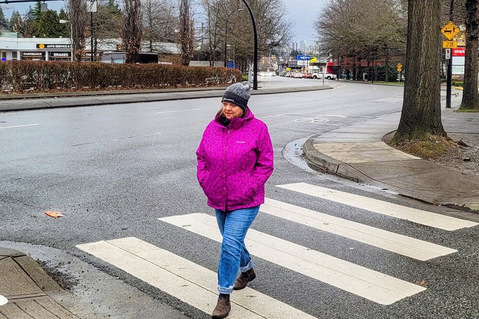 District of North Vancouver Coun. Catherine Pope crosses the slip lane at Capilano Road and Marine Drive. Slip lanes can be perilous for pedestrians and people on bikes, writes columnist Heather Drugge. | Heather Drugge 