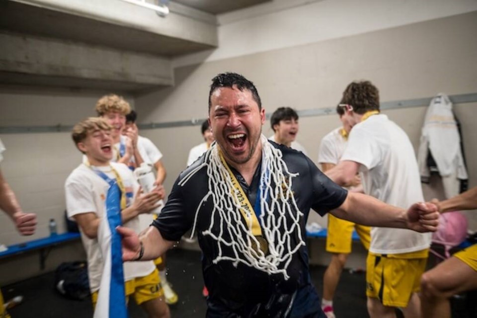 Coach Andy Wong celebrates his second provincial title with the Collingwood Cavaliers senior boys basketball team, on Saturday, March 9 at the Langley Events Centre. | Ryan Tobin 