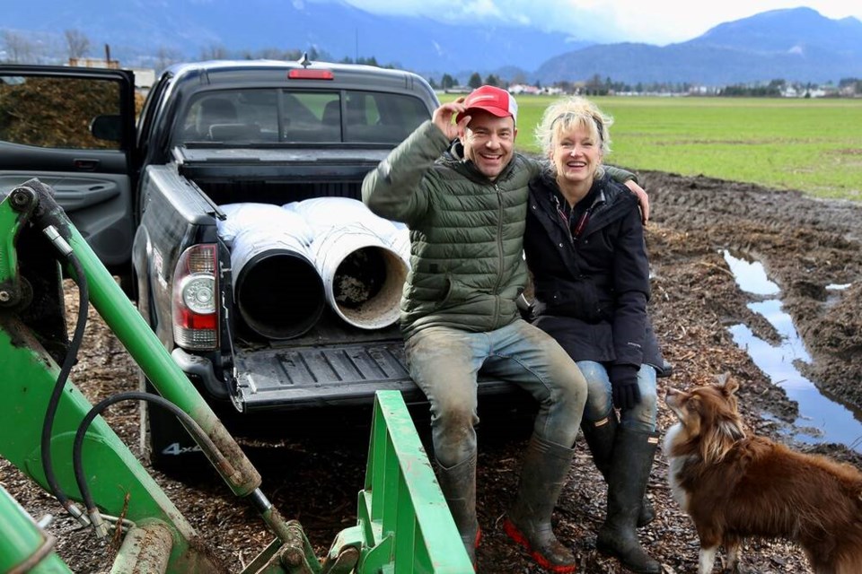 In my happy place, on a farm with my buckets, with Andrew Couzens and his sidekick Cyprus. | Laura Marie Neubert 