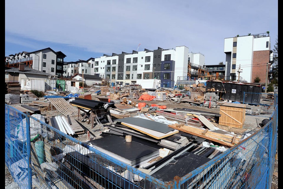 One of the last undeveloped lots in Moodyville acts as a construction staging site. The owner, developer Wall Financial, is asking the City of North Vancouver to consider allowing more height and density on the site. | Paul McGrath / North Shore News 