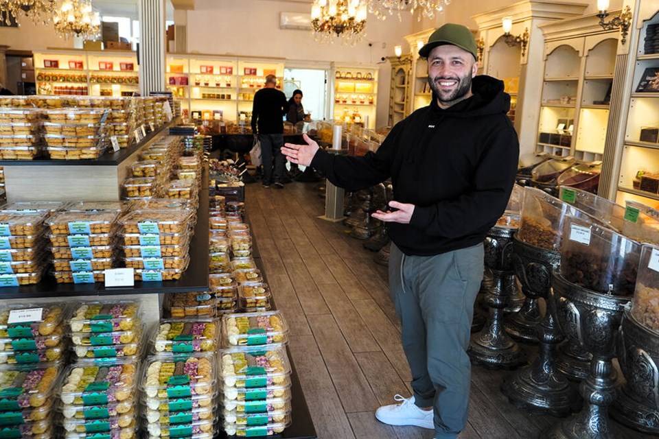 Amir Hosh, owner of Ayoub’s Dried Fruits and Nuts, is busy preparing for the bustling Nowruz season in North Vancouver. | Hamid Jafari / North Shore News 