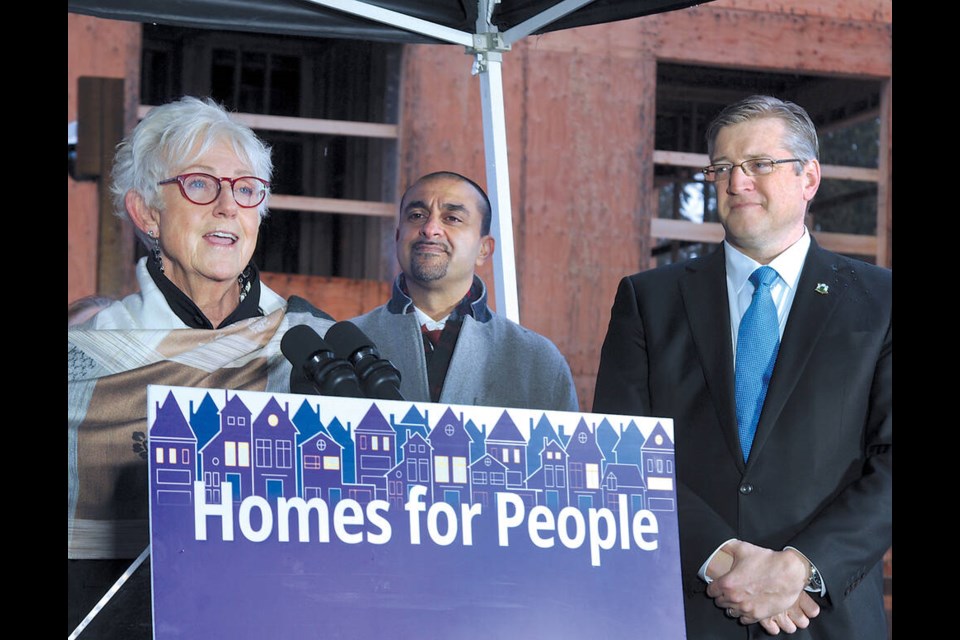 Nanette Taylor, executive director of Hollyburn Family Services Society, B.C. Minister of Housing Ravi Kahlon and District of North Vancouver Mayor Mike Little celebrate North Vancouver’s newest affordable housing project now under construction on the former Delbrook lands in North Vancouver. | Paul McGrath / North Shore News 