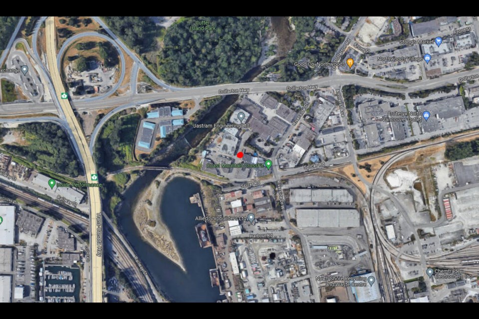A red dot marks the location of a Canada Post warehouse in North Vancouver’s Maplewood industrial area. | Google Earth 
