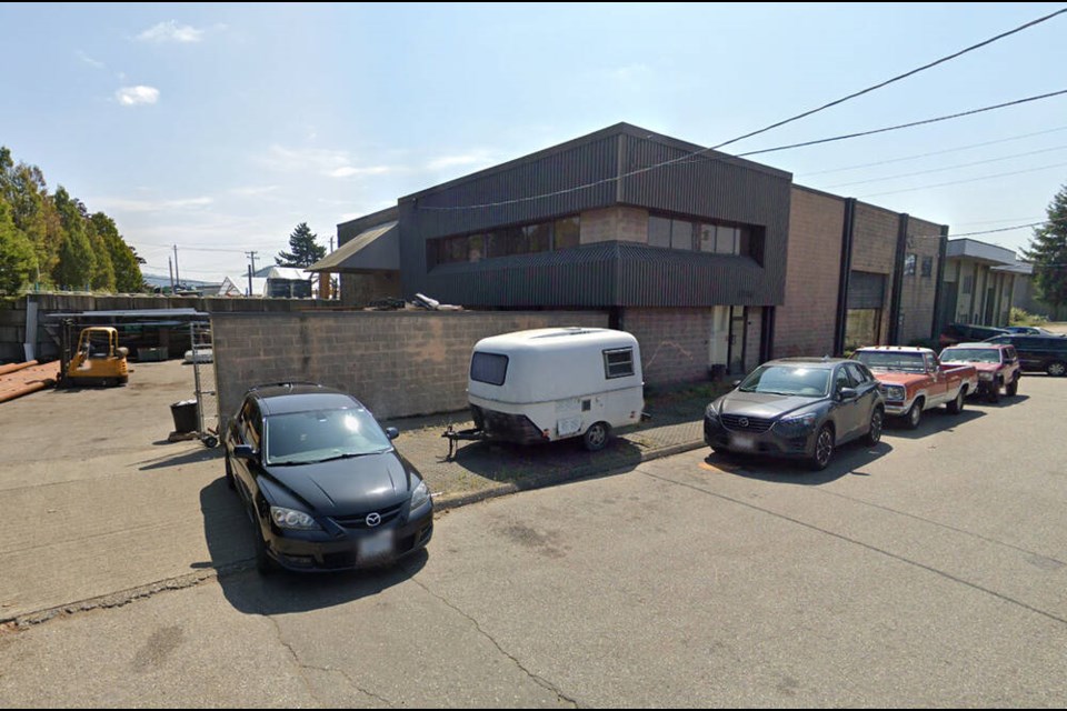 The exterior of 120 Charles St. in North Vancouver, which the Government of Canada may redevelop from a Canada Post warehouse to housing. | Google Earth 