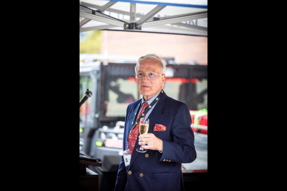 West Vancouver businessman and philanthropist Arnold Wallner toasts the new search and rescue station in North Vancouver. Wallner covered the costs of the new base next to Capilano Lake. | John Healy Photography 