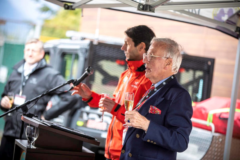North Shore Rescue team leader Mike Danks and donor Arnold Wallner toast the new search and rescue station in North Vancouver, April 6, 2024. | John Healy Photography 