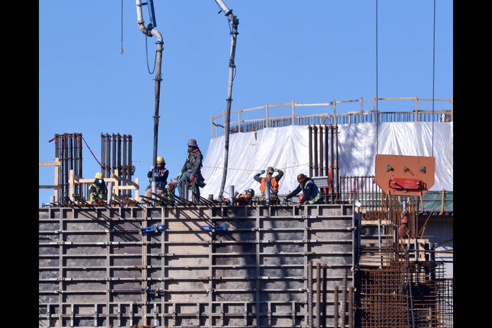 Concrete pouring into forms taking place during work on the massive new sewage treatment plant in North Vancouver in March 2021. | Paul McGrath / North Shore News
