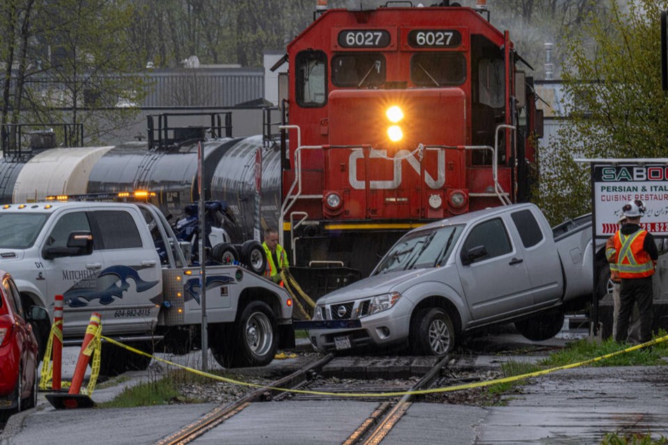 A CN train hit a truck that was crossing train tracks after exiting a parking lot in North Vancouver April 11. Luckily nobody was injured. CN Police and North Vancouver RCMP are investigating what happened. | Mark Teasdale