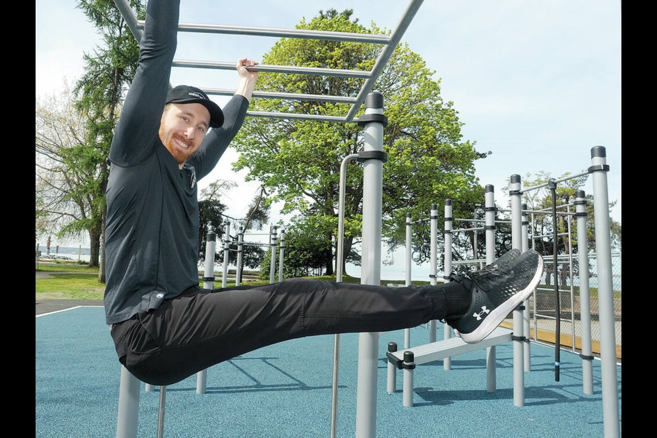 District of West Vancouver personal trainer Vladimir Ershov tries out the newly opened Keen Lau Fitness Circuit at Ambleside Park.| Paul McGrath / North Shore News 
