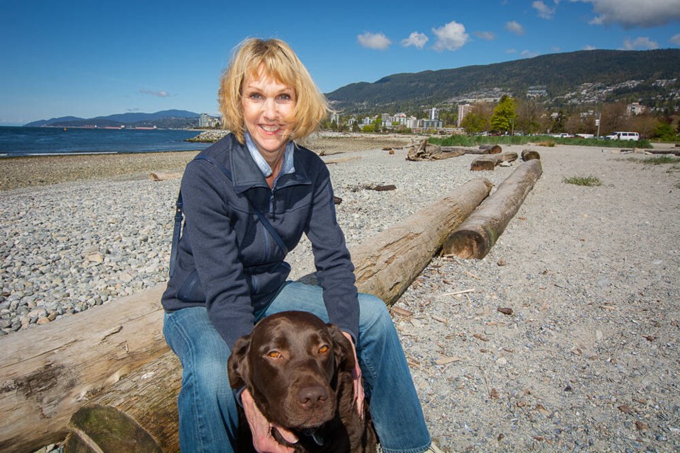 West Vancouver author Chris Read spends time with her dog Rosie at Ambleside Beach. | Nick Laba / North Shore News 