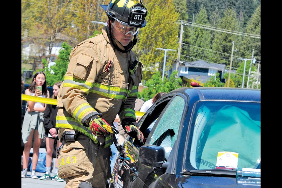First responders from multiple agencies take part in a mock crash scenario May 10 at North Vancouver’s Argyle Secondary. | Paul McGrath / North Shore News 